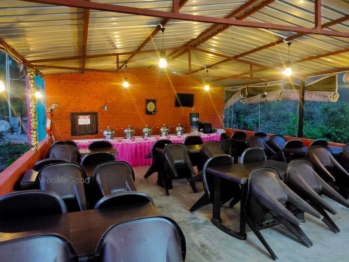 Exterior view of The Jungle Mist Café surrounded by nature in Rishikesh